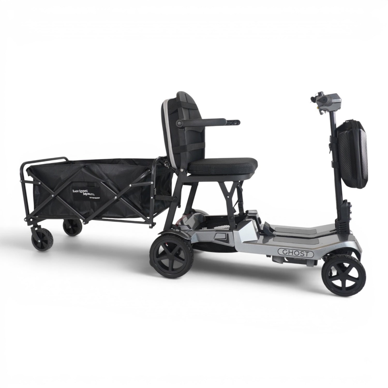 A mobility scooter with a rear cargo wagon attachment, shown on a clean white studio background. The scooter is primarily gray and black, with the black seat, wheels, and wagon bed clearly visible.
